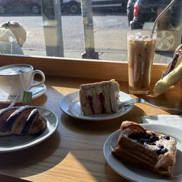 a morrocon fog, a Chocolate Croissant, a Pink Champagne - Slice, a 16 oz iced oat milk mocha, and a blueberry danish!!