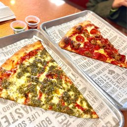 Left: Pesto pizza, Right: Pepperoni & Sausage pizza SO BOMB