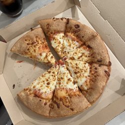 Pizza Hut - Extra cheese pizza with "normal" crust that takes up half the pizza.