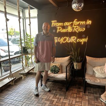 787 Coffee - Me in front of their sign! - Coffee & Tea Near Me - Carolina, Puerto Rico