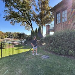 Complete Custom Cleaning - Our number 1 worker Troy getting a window spotless.
