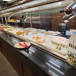 Teppanyaki & Sushi Grill Buffet - A table with different varieties of sushi's