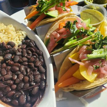 Rose's Bar and Grill - Fish tacos, minus the fish. Had scrumptious veggies instead, with garnish and pickled onions atop. - Seafood Near Me - Morro Bay, California Rose's Bar and Grill - Fish tacos, minus the fish. Had scrumptious veggies instead, with garnish and pickled onions atop. - Seafood Near Me - Morro Bay, California