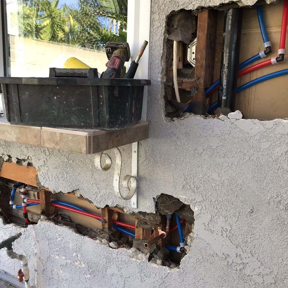 Simpex Repipe & Plumbing - Outside of the kitchen, installing the PEX - Plumbing Near Me - Irvine, California Simpex Repipe & Plumbing - Outside of the kitchen, installing the PEX - Plumbing Near Me - Irvine, California