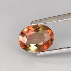 Tevington Jewelers - Andalusite- a rare pleochroic gemstone meaning it naturally shows two different colors face up.