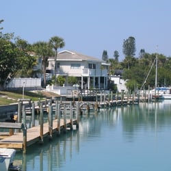 Harbor Lights Beach Resort - Vacation Rentals located directly on Casey Key in Nokomis, Florida. Boat docks onsite - steps away from the Gulf of Mexico