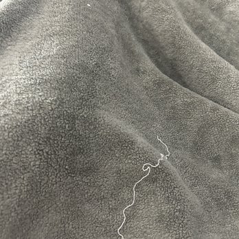 The Gotham Hotel - Dirty blanket photo, not sure the stains are clear - Hotels Near Me - New York, New York