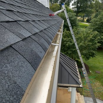 Guttertime - Fixing overflow problem, gutter holding water in the middle. - Gutter Services Near Me