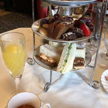 Queen Mary Tea Room - Royal tea service with spiced chai tea and a mimosa - Desserts Near Me - Seattle, Washington Queen Mary Tea Room - Royal tea service with spiced chai tea and a mimosa - Desserts Near Me - Seattle, Washington