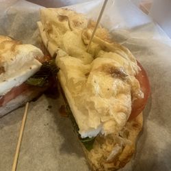Rising Roll Gourmet Café - Caprese on focaccia - fresh tomato , basil and mozzarella with balsamic glaze