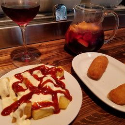 Patatas bravas, ham croquettes, sangria