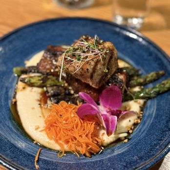 Pau Hana - Surf & Turf: Grilled Swordfish, Kabayaki Pork Belly, Parsnip Puree, Asparagus, pickled carrots, and crispy onions - Hawaiian Near Me - Savage, Minnesota