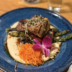 Surf & Turf: Grilled Swordfish, Kabayaki Pork Belly, Parsnip Puree, Asparagus, pickled carrots, and crispy onions
