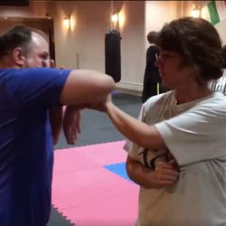 Jeremy and his wife are doing elbow passing drills.