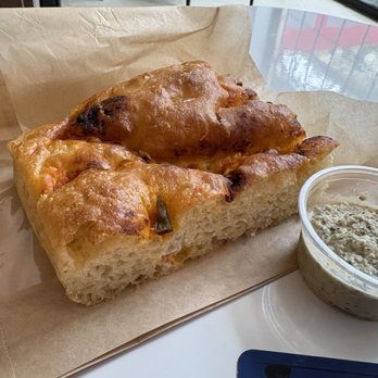 Nacha Focaccia - Piment Rouge with a coconut chutney - Bakeries Near Me - Brooklyn, New York Nacha Focaccia - Piment Rouge with a coconut chutney - Bakeries Near Me - Brooklyn, New York