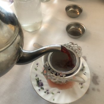 Chat Noir - Peach fruit tea - Tea Rooms Near Me - Rockville Centre, New York Chat Noir - Peach fruit tea - Tea Rooms Near Me - Rockville Centre, New York