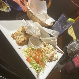 Fried fish that was gummy and chewy... I ate all the popcorn shrimp only in thing..the "pasta" in the menu is just mayo, no salt.