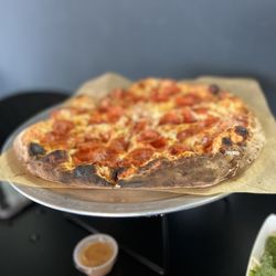 Ethos Craft Brewing - Large pepperoni pizza and salads just peeking in the picture- very good-