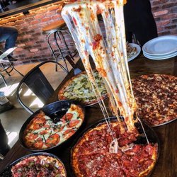 Rance's Chicago Pizza - Famous Cheese Pulls!