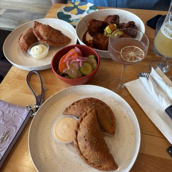 MINT Mojito Bar - Beef and shrimp empanadas. Seasonal pickled vegetables. Pork belly . - Cocktail Bars Near Me - Buffalo, New York
