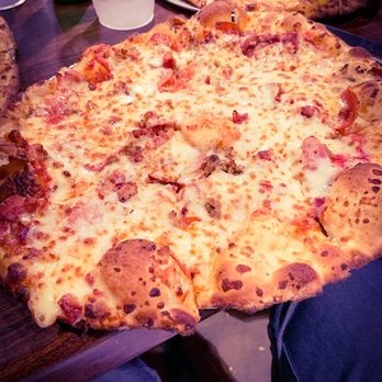 Heat Pizza Bar - Meat Lovers Pizza...SO crispy and thin! - Bars Near Me - Tuscaloosa, Alabama