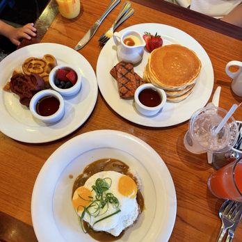 Makahiki - Locco Mocco, side of mini and Mickey waffles, pancakes with Portuguese sausage - Bars Near Me - Kapolei, Hawaii Makahiki - Locco Mocco, side of mini and Mickey waffles, pancakes with Portuguese sausage - Bars Near Me - Kapolei, Hawaii