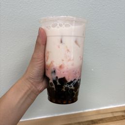 Strawberry Milk Latte with brown sugar boba and herbal jelly