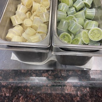 King Pollo - two trays of food on a counter - Peruvian Near Me - Alexandria, Virginia