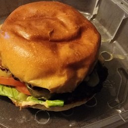 a sandwich in a styrofoam container a sandwich in a styrofoam container