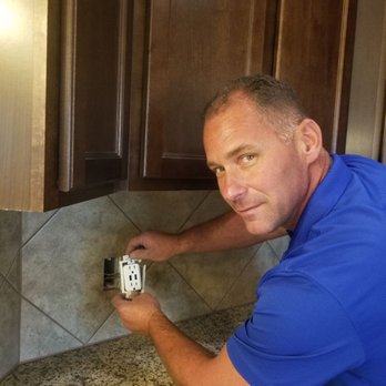 Brighthouse Electric - Licensed master electrician installing gfci - Electricians Near Me