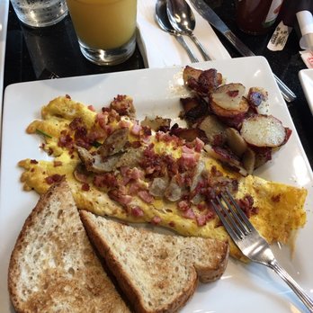 Keke's Breakfast Cafe - 3 meat and cheese omelette - Breakfast & Brunch Near Me - Windermere, Florida Keke's Breakfast Cafe - 3 meat and cheese omelette - Breakfast & Brunch Near Me - Windermere, Florida
