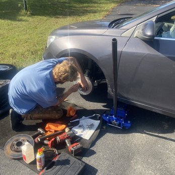 Payne's Mobile Repair - Curtis working on putting new rotors and brakes on the front. - Auto Repair Near Me - Spotsylvania, Virginia Payne's Mobile Repair - Curtis working on putting new rotors and brakes on the front. - Auto Repair Near Me - Spotsylvania, Virginia