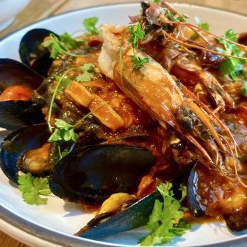 OSTE - this is the Squid ink pasta with muscles, clams, squid giant prawns in a marinara sauce. - Italian Near Me - Los Angeles, California