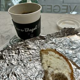 Coffee, salt bagel mit schmear. Coffee, salt bagel mit schmear.