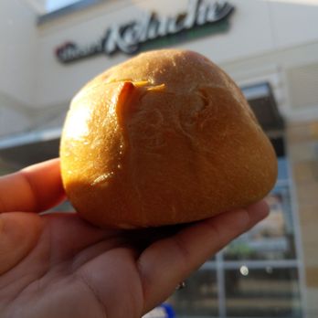 Orion Donut & Kolache - a hand holding a donut - Bakeries Near Me - Frisco, Texas Orion Donut & Kolache - a hand holding a donut - Bakeries Near Me - Frisco, Texas