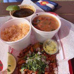 Birria Spot Texas - Pastor taco, added on a side of rice, beans, and consume.