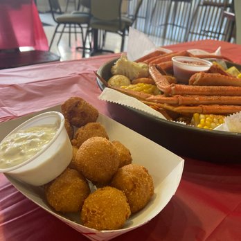 Macker Seafood - Hush puppies and seafood tray - Seafood Near Me - Daytona Beach, Florida Macker Seafood - Hush puppies and seafood tray - Seafood Near Me - Daytona Beach, Florida