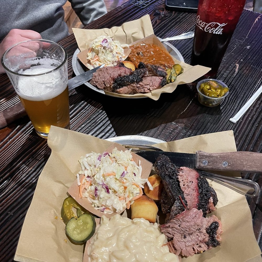 Brisket plate with smoked Gouda mac, coleslaw, beans, homemade pickles and jalapeños. Brisket plate with smoked Gouda mac, coleslaw, beans, homemade pickles and jalapeños.