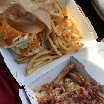 Buffalo Wild Wings - Crispy Buffalo Chicken Sandwich w/ fries and potatoe wedges with queso and bacon. - Chicken Wings Near Me - Spring, Texas Buffalo Wild Wings - Crispy Buffalo Chicken Sandwich w/ fries and potatoe wedges with queso and bacon. - Chicken Wings Near Me - Spring, Texas