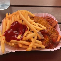 Die Bude - Eating currywurst in no man's land at Checkpoint Charlie.#Ironic