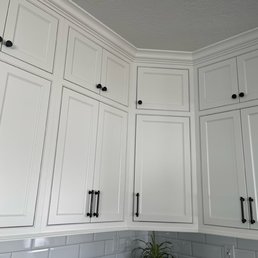 Beaded inset Omega cabinets in Pearl White Beaded inset Omega cabinets in Pearl White