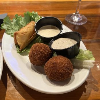 Cypress Grill - Cross crawfish, eggroll and Boudin balls - American Near Me - Austin, Texas