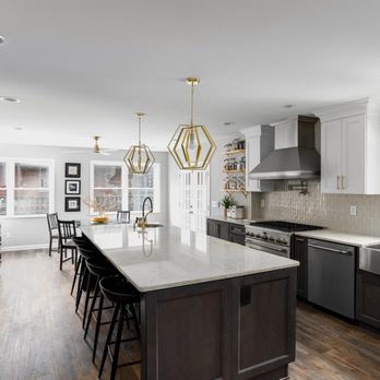 SemBro Designs Columbus - Kitchen and Bath Remodeling - a kitchen with a large island, a sink, a stove, and - Kitchen & Bath Near Me - Columbus, Ohio SemBro Designs Columbus - Kitchen and Bath Remodeling - a kitchen with a large island, a sink, a stove, and - Kitchen & Bath Near Me - Columbus, Ohio