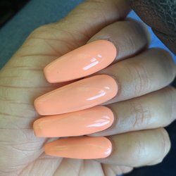 Crystal Nails - Lumpy polish with black spots from dust or other particles
