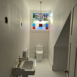 Epic Restoration Services - Finishing construction of new floor plan for bathroom where closet was