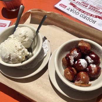 Rodeo Goat - Goat Balls (fried Brie in biscuit dough) with blackberry compote & powdered sugar plus 2 vanilla bean scoops - Burgers Near Me - Houston, Texas Rodeo Goat - Goat Balls (fried Brie in biscuit dough) with blackberry compote & powdered sugar plus 2 vanilla bean scoops - Burgers Near Me - Houston, Texas