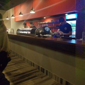 Hand Roll Sushi - Busy at work rolling sushi - Sushi Bars Near Me - Orlando, Florida Hand Roll Sushi - Busy at work rolling sushi - Sushi Bars Near Me - Orlando, Florida