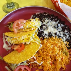 Ixtapa Mexican Restaurant - 3 taco meal with beef and black beans - wish they were traditional corn tortillas