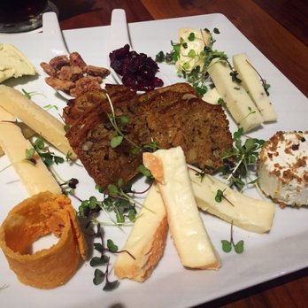 Bistro Menil - Cheese plate with candied walnuts and dried cranberries on the side - Bars Near Me - Houston, Texas Bistro Menil - Cheese plate with candied walnuts and dried cranberries on the side - Bars Near Me - Houston, Texas