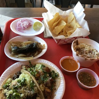 Backyard Taco - Chicken & beef tacos (both on flour tortilla). Chips with beans & cheese. Side of grilled onion & jalepeno. - Mexican Near Me - Mesa, Arizona Backyard Taco - Chicken & beef tacos (both on flour tortilla). Chips with beans & cheese. Side of grilled onion & jalepeno. - Mexican Near Me - Mesa, Arizona